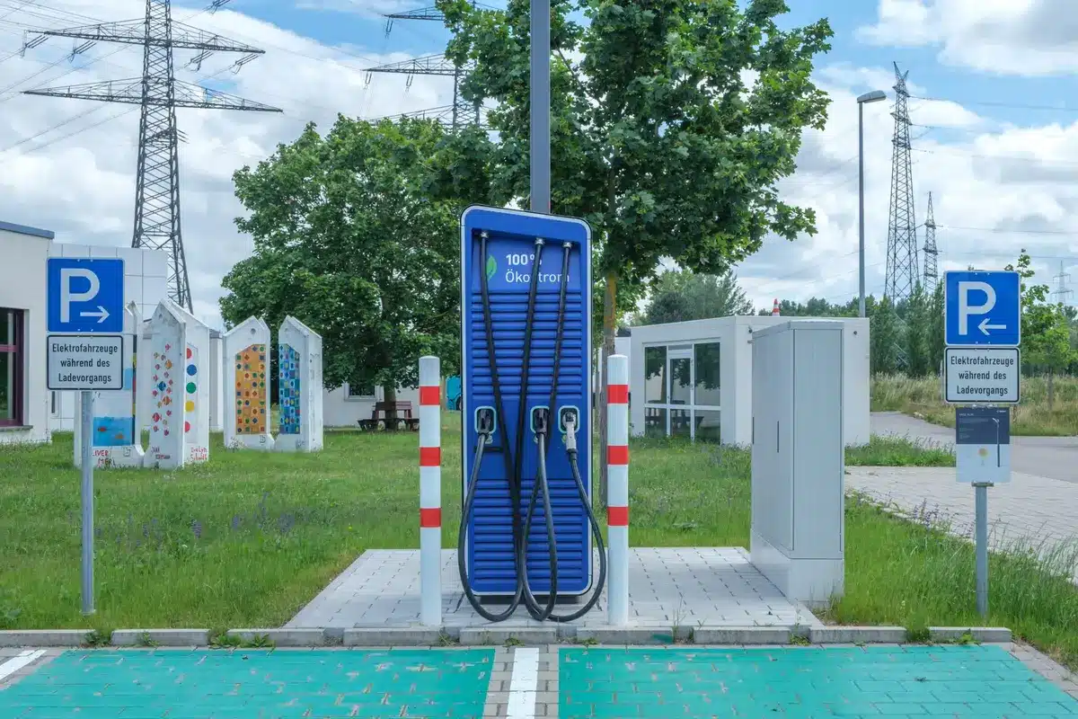 Electric bus at charging station with modern infrastructure