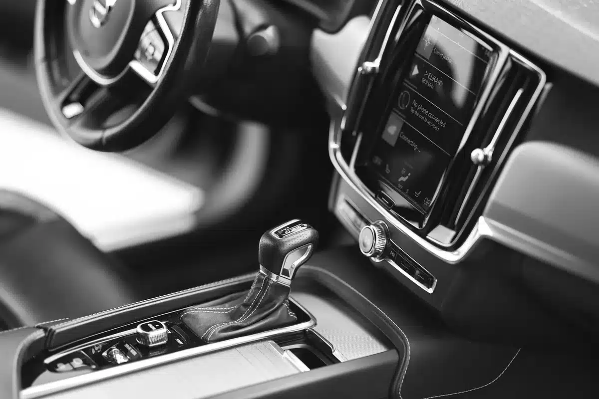 Minimalist car dashboard with large central display screens