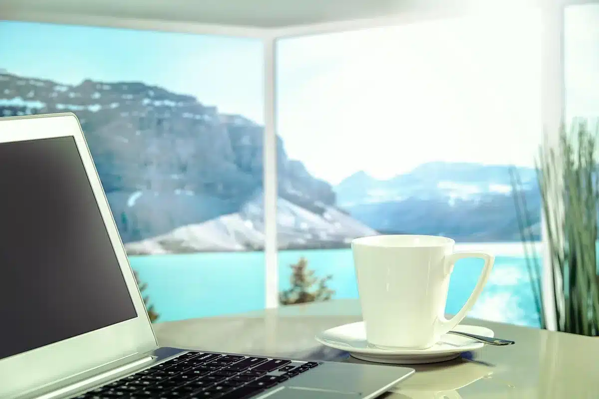 Laptop showing a private browser window on a bright desk